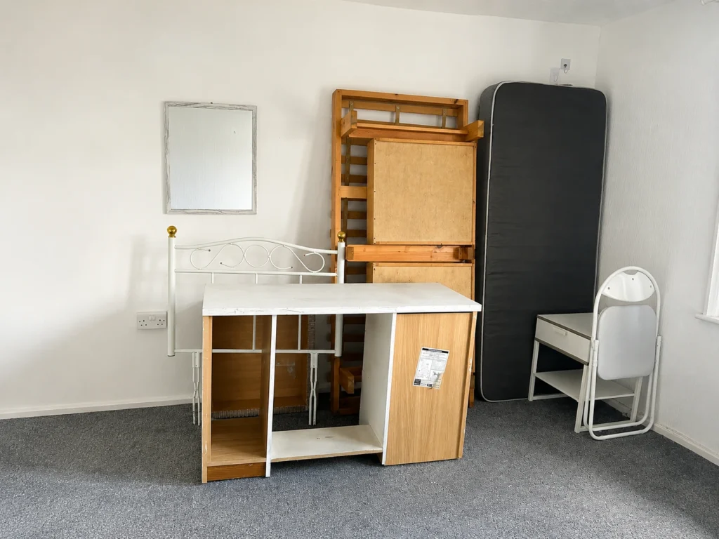 Bed frame and wardrobe dismantled for a house removals Liverpool